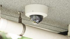 A CCTV camera mounted in a residential building