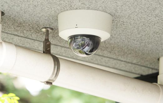 A CCTV camera mounted in a residential building