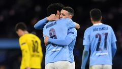 Manchester City midfielder Phil Foden (second right) celebrates his goal against Borussia Dortmund