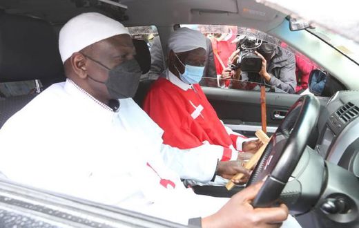 Deputy President William Ruto hands over a new car that he donated to the African Church of the holy spirit high priest Shem Shamalla at Malava in Kakamega on September 18, 2021