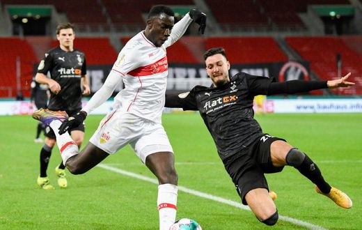 Stuttgart forward Silas Wamangituka (L) - real name Silas Katompa Mvumpa - has been fined and banned for playing under a false identity