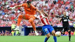 Artful dodger: Angel Correa dodged a challenge from goalie Kiko Casillas and ran on to score