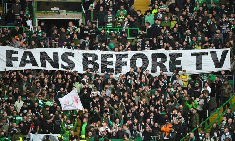 Celtic supporters protest against the 1430GMT kick-off time for their Europa League clash with Ferencvaros