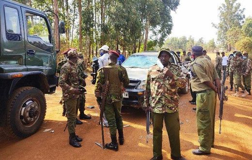 Police officers keeping guard during Kabuchai by-election