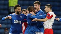Ondrej Kudela (R) was given a 10-match ban for racially abusing Rangers midfielder Glen Kamara (C) earlier this year
