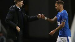 Steven Gerrard (left)led Rangers to a first Scottish Premiership title for 10 years last season