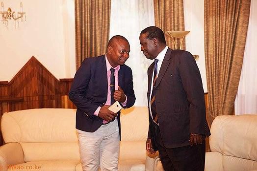 NASA leader Raila Odinga and ODM Communication Director Phillip Etale. Etale's father died on Sunday evening after a long illness.