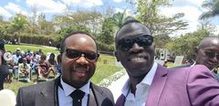 Journalist Trevor Ombija with the groom during Silas Jakakimba and his bride Florence's wedding held at the Safari Park Hotel in Nairobi on October 16, 2021