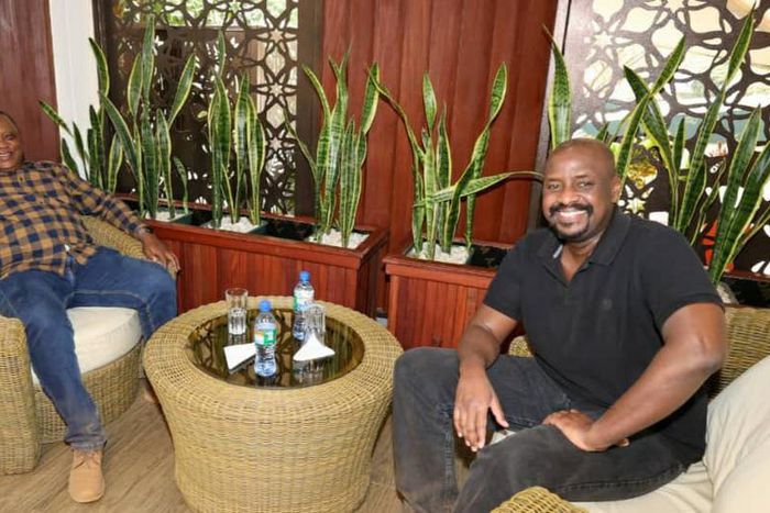 President Uhuru Kenyatta hangs out with Uganda’s Commander of Land Forces (CLF), Lieutenant General, Muhoozi Kainerugaba who is also President Yoweri Museveni’s son