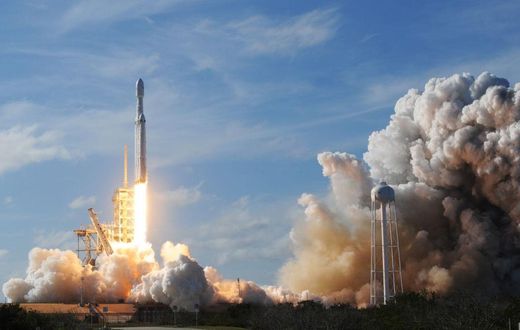The SpaceX Falcon Heavy launches from Pad 39A at the Kennedy Space Center in Florida, on February 6, 2018, on its demonstration mission. - (Photo by JIM WATSON/AFP via Getty Images)