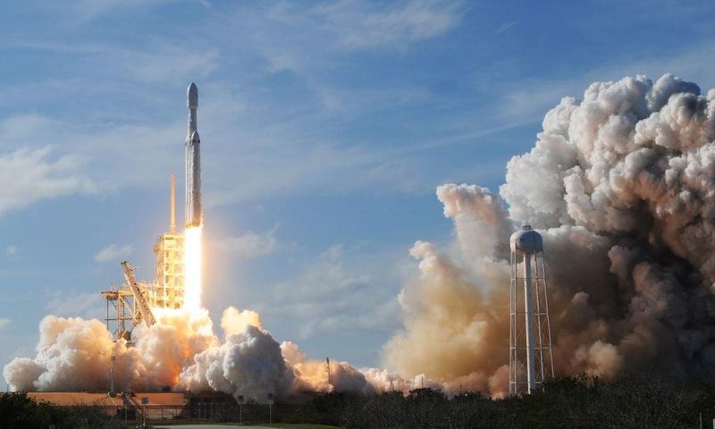The SpaceX Falcon Heavy launches from Pad 39A at the Kennedy Space Center in Florida, on February 6, 2018, on its demonstration mission. - (Photo by JIM WATSON/AFP via Getty Images)