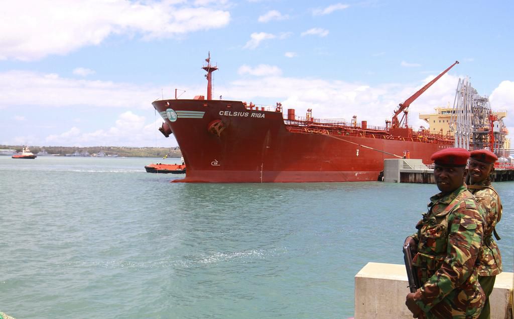 Kenyan police officers stand guard as the oil tanker Celsius Riga prepares to sail off with over 200,000 barrels of Kenya's first oil export, from the port of Mombasa, Kenya August 26, 2019.