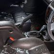 Shattered glass inside of a car after an ambush