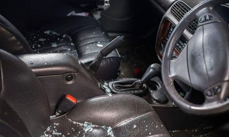 Shattered glass inside of a car after an ambush