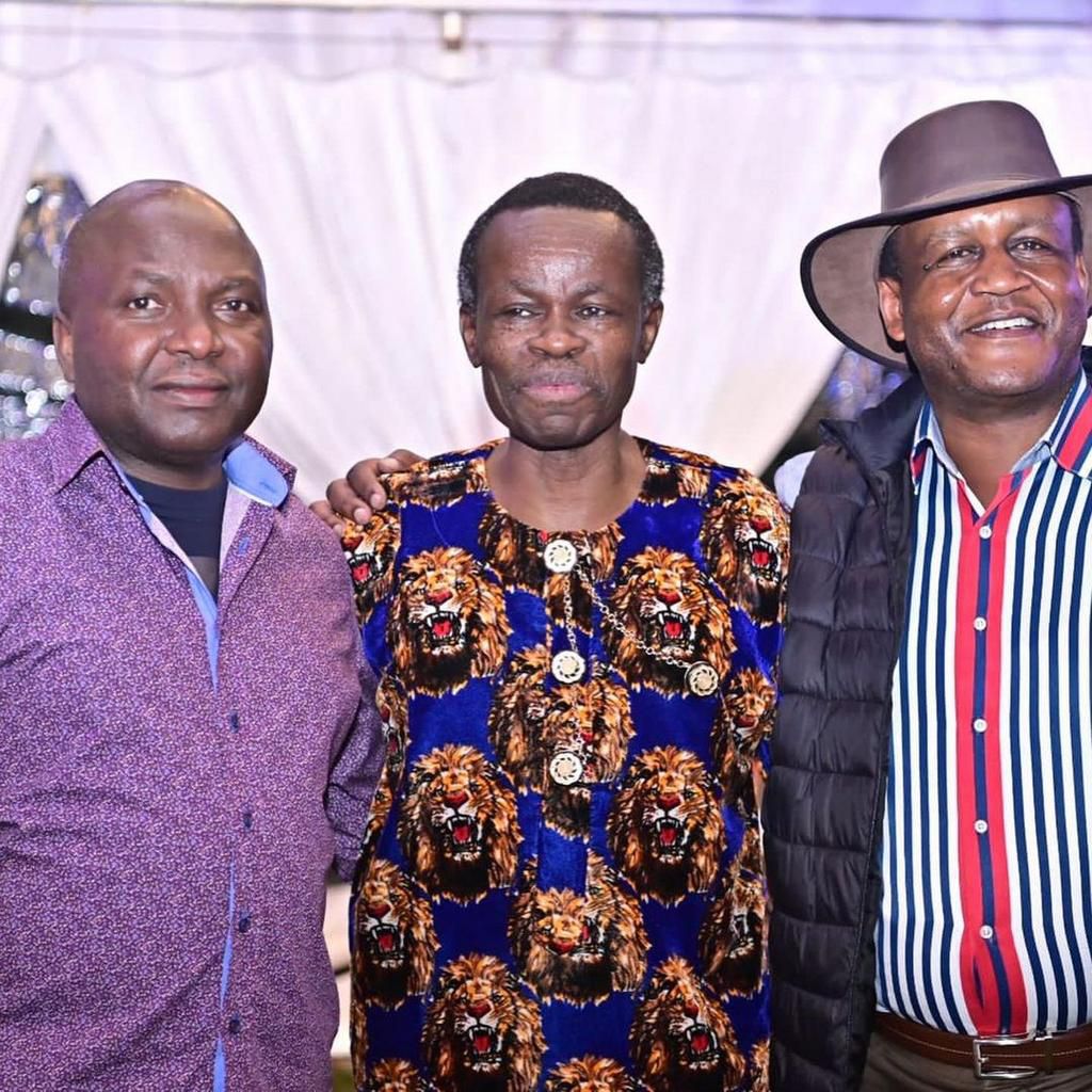Donald Kipkorir with PLO Lumbumba