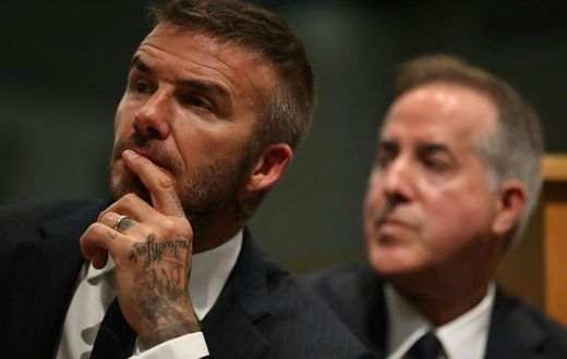 David Beckham and Jorge Mas (R), whose Inter Miami MLS club has been fined $2 million for roster and salary rules violations in the singing of French World Cup-winner Blaise Matiudi