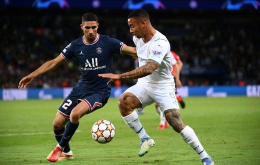 Paris Saint-Germain full-back Achraf Hakimi (L) scored the first goal as Morocco trounced Guinea-Bissau 5-0 on Wednesday in a World Cup qualifier