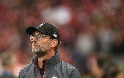 Liverpool manager Jurgen Klopp has told the club's fans to stop their homophobic chanting labelling those who do as idiots