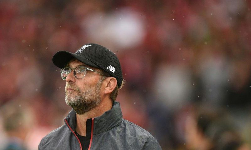 Liverpool manager Jurgen Klopp has told the club's fans to stop their homophobic chanting labelling those who do as idiots