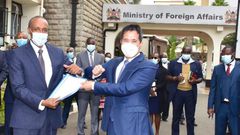Kenya’s Foreign Affairs Principal Secretary Amb. Macharia Kamau with Chinese Ambassador to Kenya H.E. Zhou Pingjian