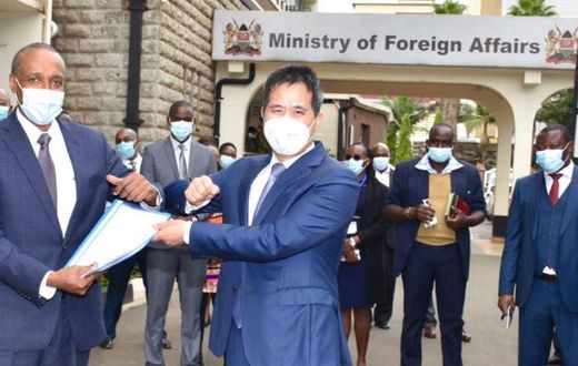 Kenya’s Foreign Affairs Principal Secretary Amb. Macharia Kamau with Chinese Ambassador to Kenya H.E. Zhou Pingjian