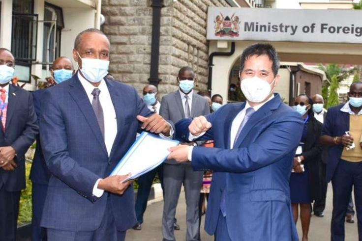 Kenya’s Foreign Affairs Principal Secretary Amb. Macharia Kamau with Chinese Ambassador to Kenya H.E. Zhou Pingjian