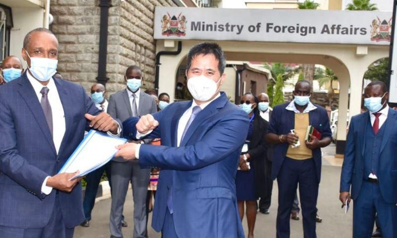 Kenya’s Foreign Affairs Principal Secretary Amb. Macharia Kamau with Chinese Ambassador to Kenya H.E. Zhou Pingjian