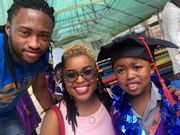 Mwende Macharia with Champ., J Blessing. J Blessing joins Mwende Mwacharia to celebrate their son’s graduation