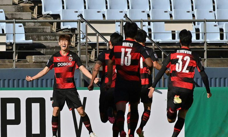 Pohang Steelers' Lee Seung-mo celebrates scoring against
Nagoya Grampus