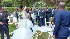 Silas Jakakimba and his bride Florence during their wedding held at the Safari Park Hotel in Nairobi on October 16, 2021