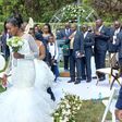 Silas Jakakimba and his bride Florence during their wedding held at the Safari Park Hotel in Nairobi on October 16, 2021