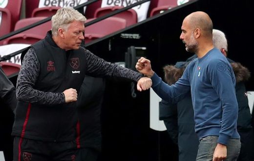 Pep Guardiola (right) has praised the work of David Moyes at West Ham