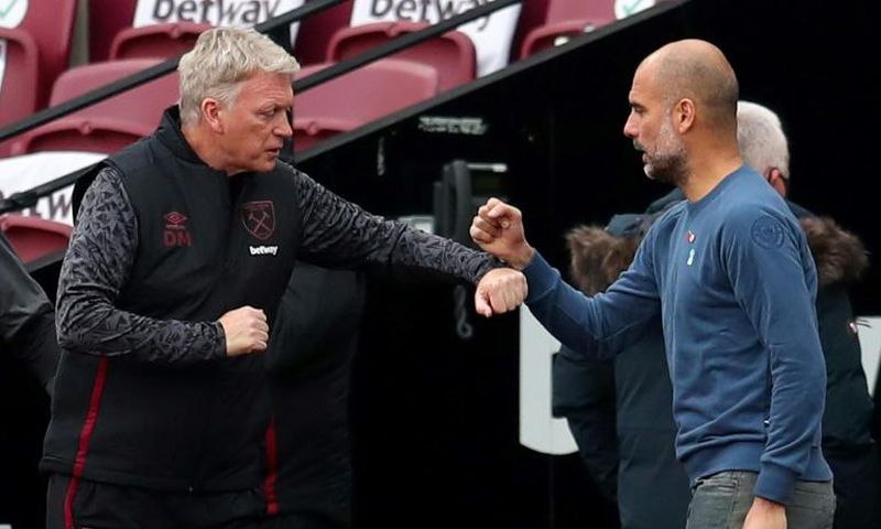 Pep Guardiola (right) has praised the work of David Moyes at West Ham