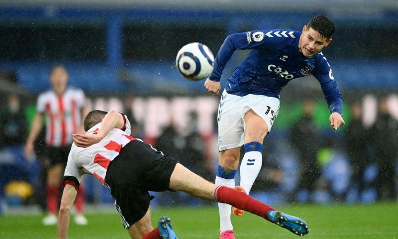James Rodriguez (right)will miss Everton's opening Premier League game of the season due to being in self-isolation