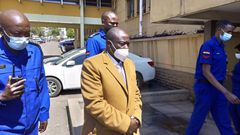 Mathira MP Rigathi Gachagua accompanied by police officers during his arraignment on Monday July 26th, 2021