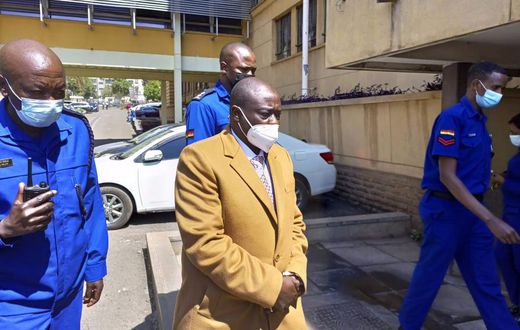 Mathira MP Rigathi Gachagua accompanied by police officers during his arraignment on Monday July 26th, 2021