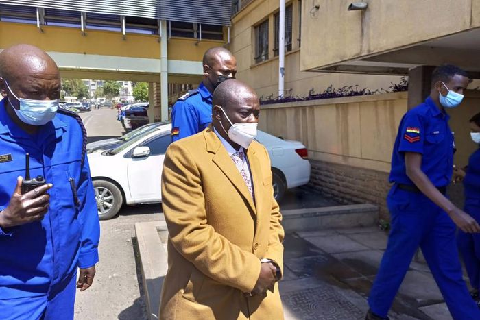 Mathira MP Rigathi Gachagua accompanied by police officers during his arraignment on Monday July 26th, 2021