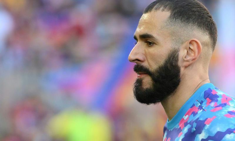 Real Madrid striker Karim Benzema has been handed down a tougher than expected one-year suspended sentence for complicity in a bid to blackmail his former France team-mate Mathieu Valbuena