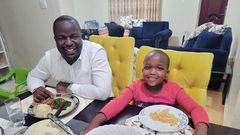 Kevin Otiende and Ethan Macharia enjoying dinner