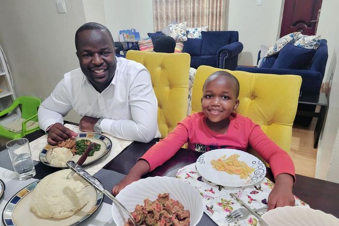 Kevin Otiende and Ethan Macharia enjoying dinner