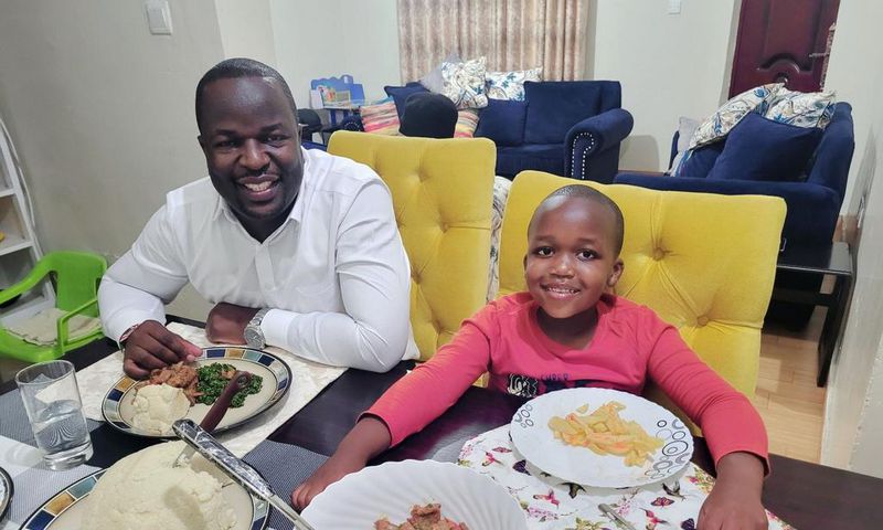 Kevin Otiende and Ethan Macharia enjoying dinner
