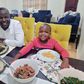 Kevin Otiende and Ethan Macharia enjoying dinner