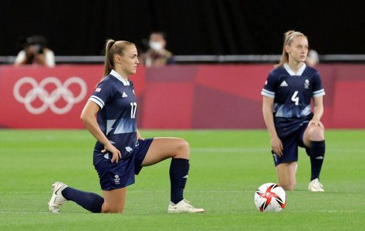 Team GB players took the knee before their win over Chile