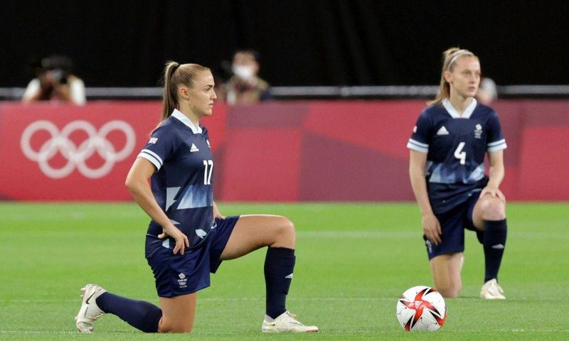 Team GB players took the knee before their win over Chile