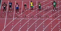 (From L) Kenya's Ferdinand Omurwa, France's Jimmy Vicaut, USA's Fred Kerley, Canada's Andre De Grasse, Jamaica's Yohan Blake, South Africa's Gift Leotlela and Nigeria's Usheoritse Itsekiri prepare to compete in the men's 100m semi-finals during the Tokyo 2020 Olympic Games at the Olympic Stadium in Tokyo on August 1, 2021. (Photo by Antonin THUILLIER / AFP) (Photo by ANTONIN THUILLIER/AFP via Getty Images