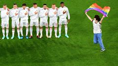 One fan invaded the pitch to brandish a rainbow flag