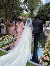 Deputy President William Ruto and wife Rachel walk June Ruto on the aisle at her wedding