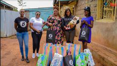 (L to R) Camilla Owora, PR Manager Boomplay, Elizabeth Karuru, Content Acquisition Manager Boomplay, Njeri Migwi, Executive Director, Usikimye, Martha Huro Managing Director EA Boomplay and Terry, House Manager Usikimye are all smiles during the handov...