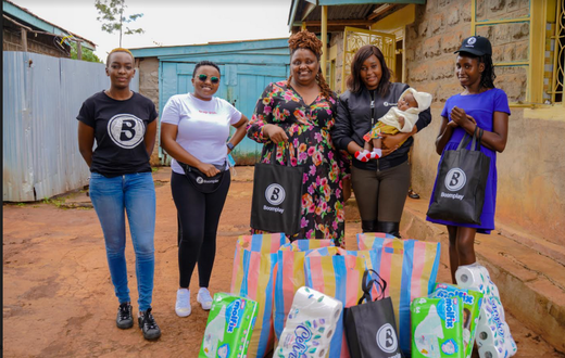 (L to R) Camilla Owora, PR Manager Boomplay, Elizabeth Karuru, Content Acquisition Manager Boomplay, Njeri Migwi, Executive Director, Usikimye, Martha Huro Managing Director EA Boomplay and Terry, House Manager Usikimye are all smiles during the handov...