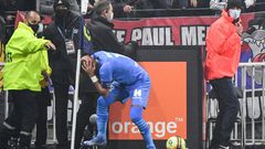 Marseille's Dimitri Payet was struck on the head by a bottle of water thrown from the crowd as he went to take a corner in the Ligue 1 game against Lyon last month
